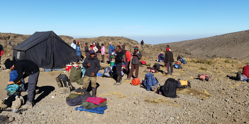 School Hut to summit at Uhuru Peak, descent to Millennium Camp